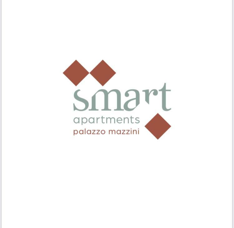 Smart Apartments Palazzo Mazzini Роверето Екстер'єр фото